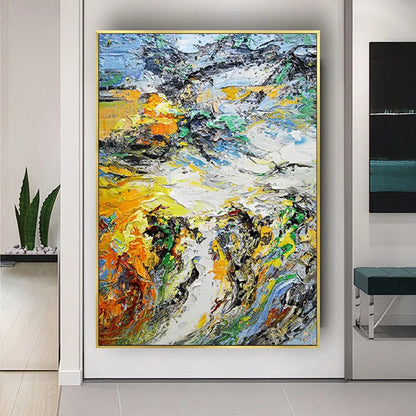 Room mockup showing dense expressive yellow, white, dark grey and green strokes with small orange and blue accents.