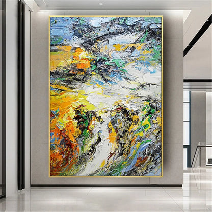 Room mockup showing dense expressive yellow, white, dark grey and green strokes with small orange and blue accents.