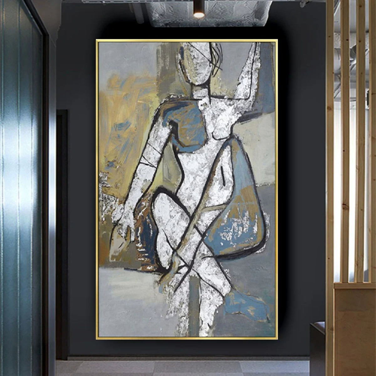 Room mockup. Seated figure formed from angular white, grey and blue shapes with black outlines on a muted ochre ground.