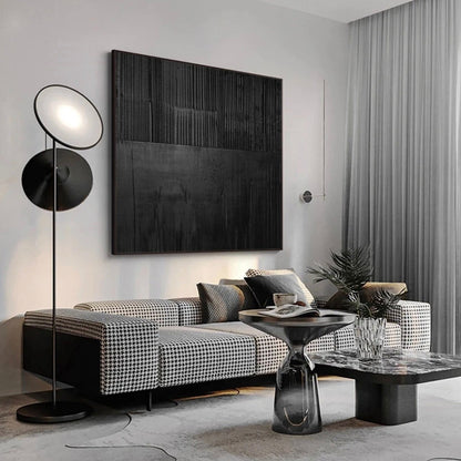 Room mockup. A nearly black square with fine vertical ridges and subtle overlapping charcoal rectangular patches.