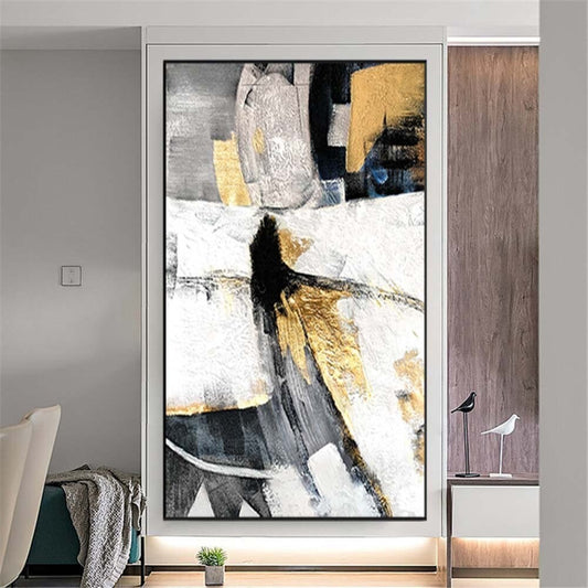 Room mockup. Black, grey and white angular shapes with gold-coloured patches suggest an elongated abstract figure.