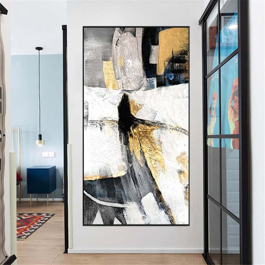 Room mockup. Black, grey and white angular shapes with gold-coloured patches suggest an elongated abstract figure.