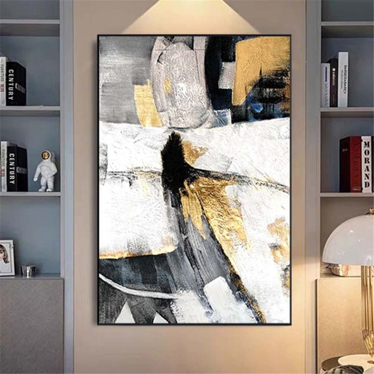Room mockup. Black, grey and white angular shapes with gold-coloured patches suggest an elongated abstract figure.