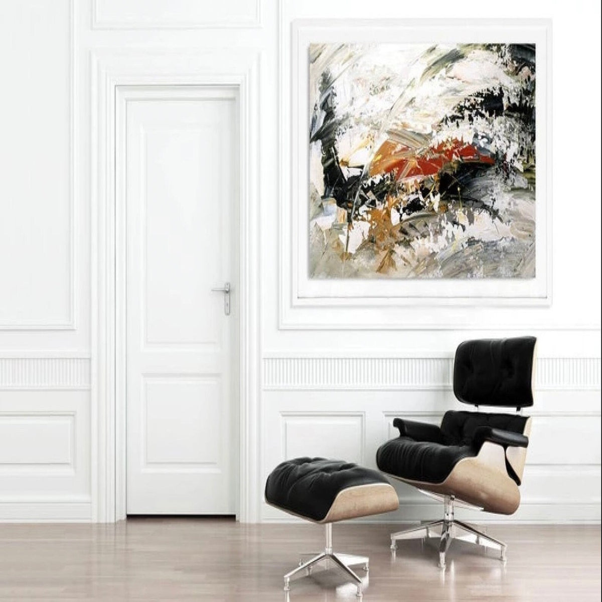 Room mockup. Broad black and white textured strokes with rust-red and ochre accents in a swirling abstract composition.