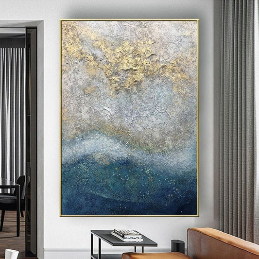 Room mockup. A dark blue lower field fades through grey into pale cream, with rough gold-coloured texture near the upper area.