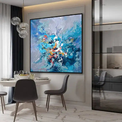 Room mockup showing blue and lavender abstract with a concentrated burst of turquoise, white, red and orange marks near the centre.