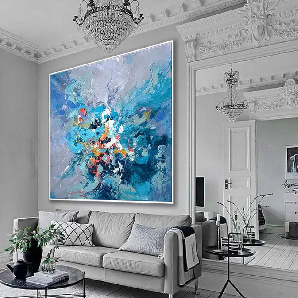 Room mockup showing blue and lavender abstract with a concentrated burst of turquoise, white, red and orange marks near the centre.