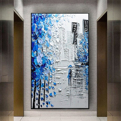 Room mockup. Thick blue and white tree-like marks frame grey city buildings and a small blue figure on a reflective street.