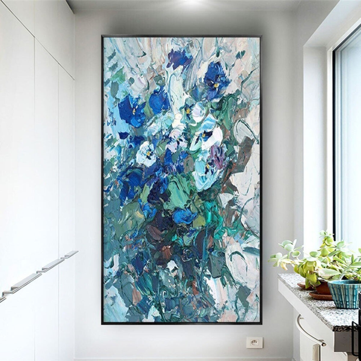 Room mockup. Dense blue and turquoise flower-like dabs with grey stems and white textured strokes on a pale ground.