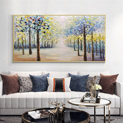 Room mockup. Two rows of dark trees with blue, white and yellow foliage border a pale path receding into a bright misty centre.