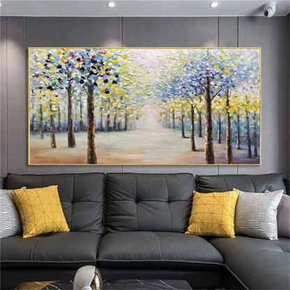 Room mockup. Two rows of dark trees with blue, white and yellow foliage border a pale path receding into a bright misty centre.