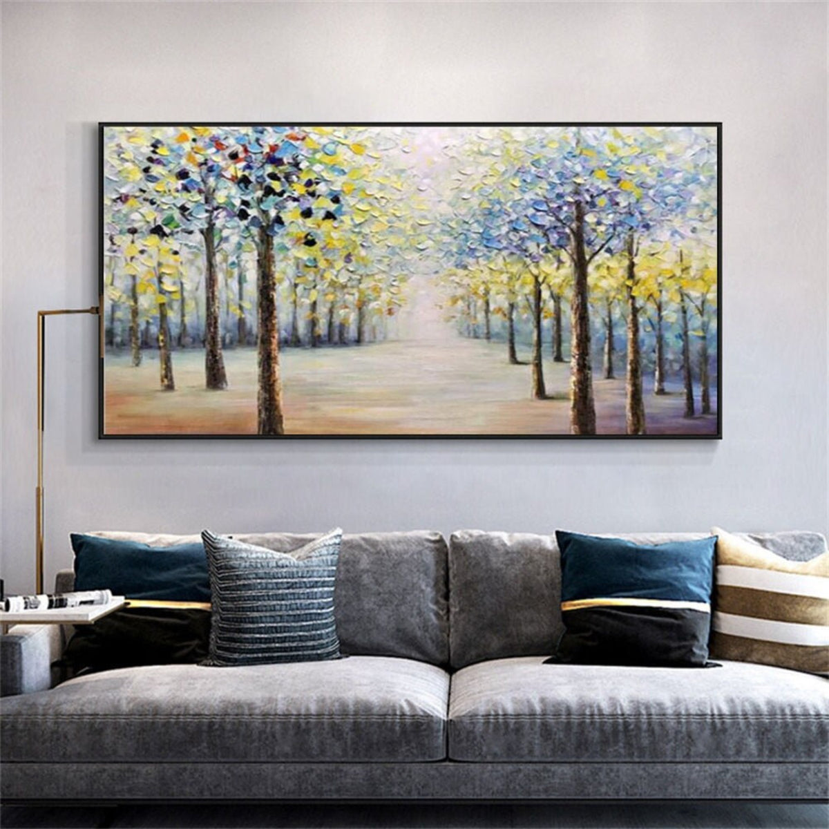 Room mockup. Two rows of dark trees with blue, white and yellow foliage border a pale path receding into a bright misty centre.