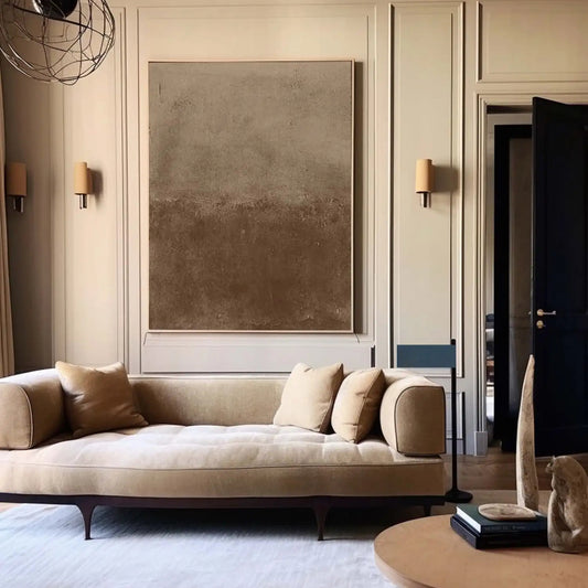 Room mockup showing soft mottled beige upper area blending into a deeper brown lower field with fine rough texture.
