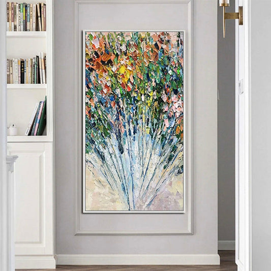 Room mockup. A dense bouquet of small pink, orange, yellow, green and blue textured dabs fans out above long fine blue stems.