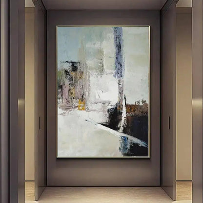 Room mockup showing cream abstract painting with pale blue-grey blocks, a tall dark streak and black and brown angular lower shapes.