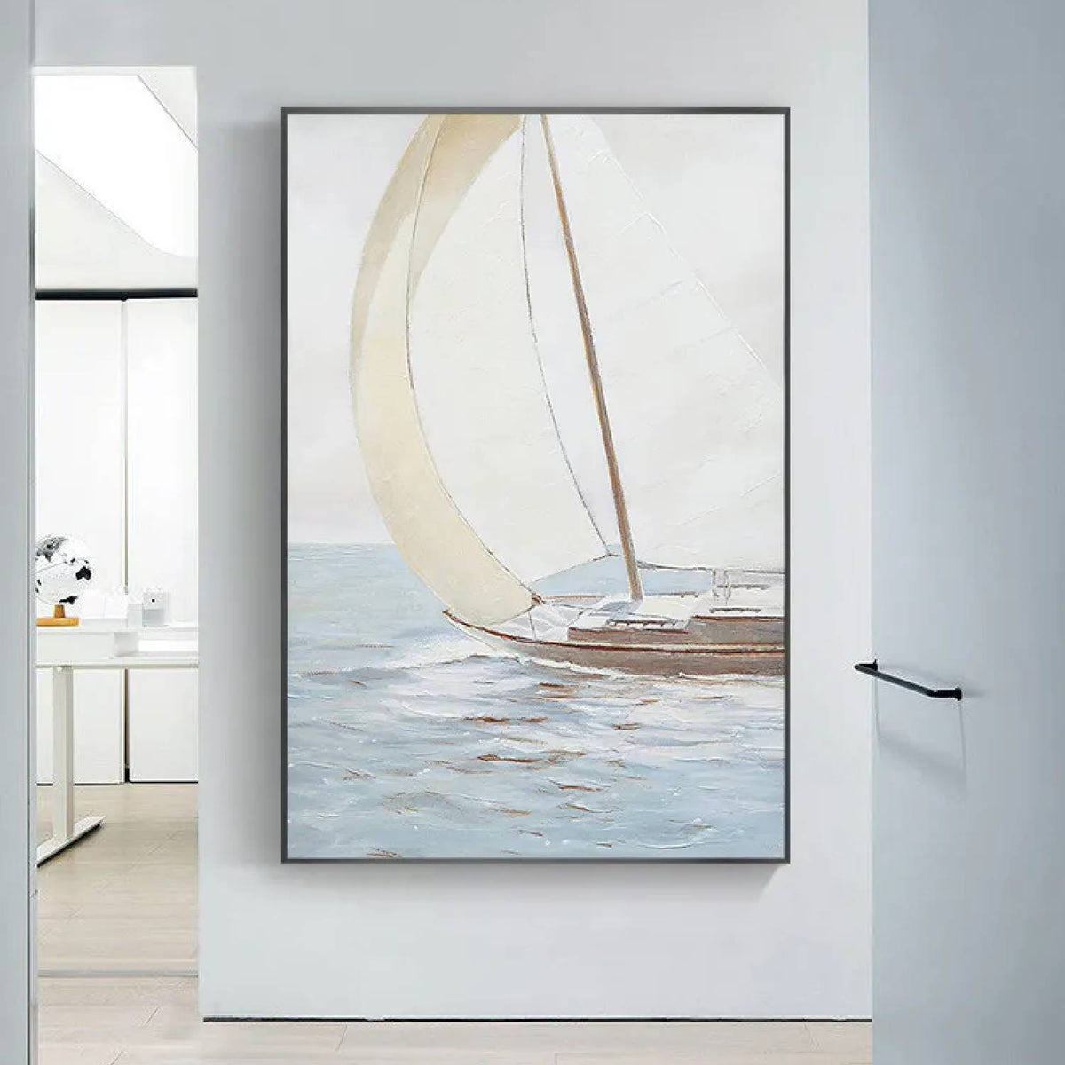 Room mockup. A small brown-hulled boat with a broad curved cream sail on pale blue-grey water beneath a soft white sky.