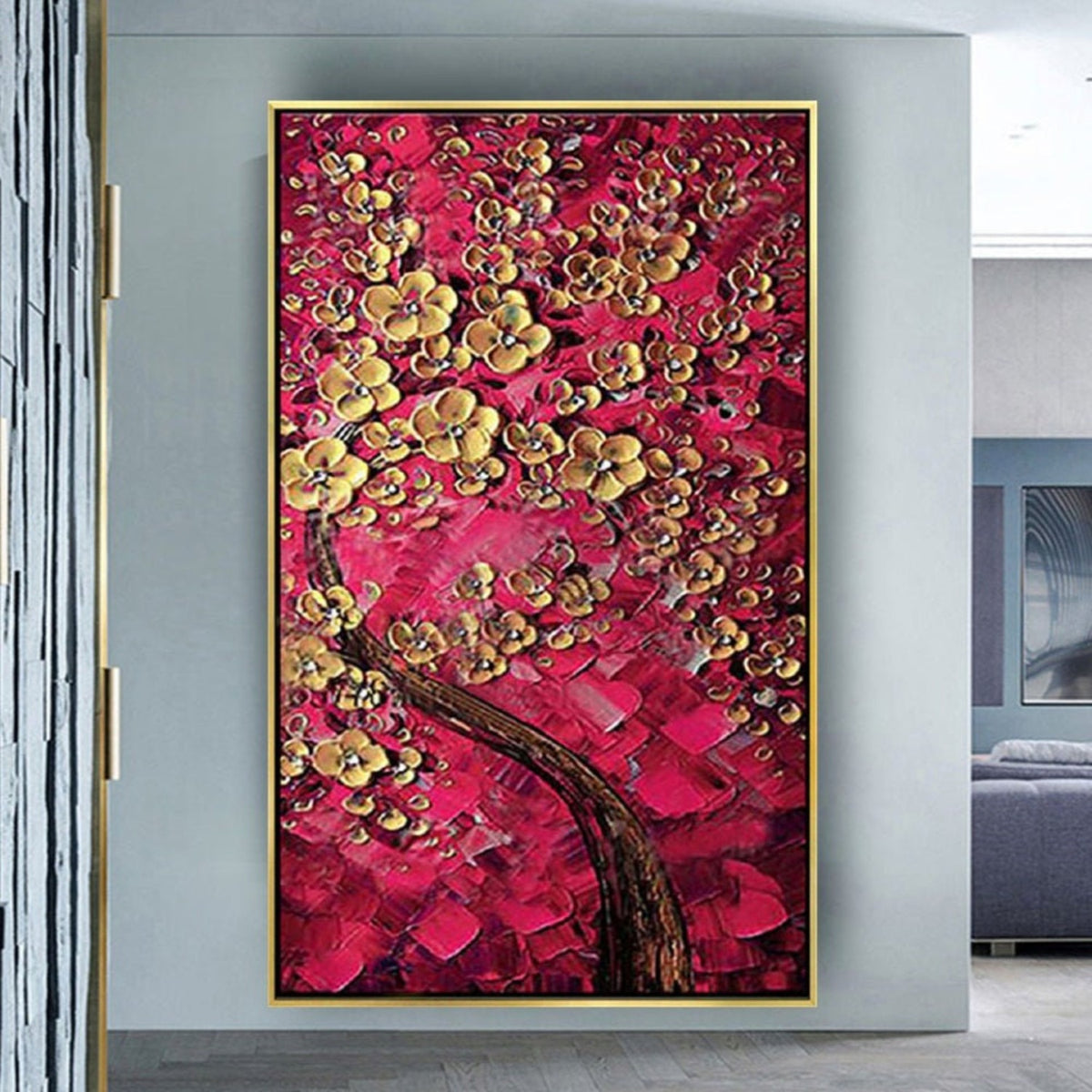 Room mockup. A dark curving tree trunk supports clusters of raised gold-coloured blossoms against dense red and crimson textured dabs.