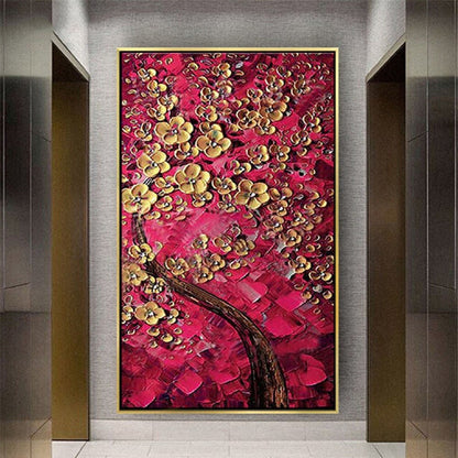 Room mockup. A dark curving tree trunk supports clusters of raised gold-coloured blossoms against dense red and crimson textured dabs.