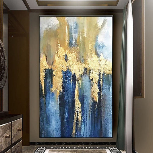 Room mockup. A dense gold-coloured textured band with long hanging strokes above deep blue, grey and pale cream vertical fields.