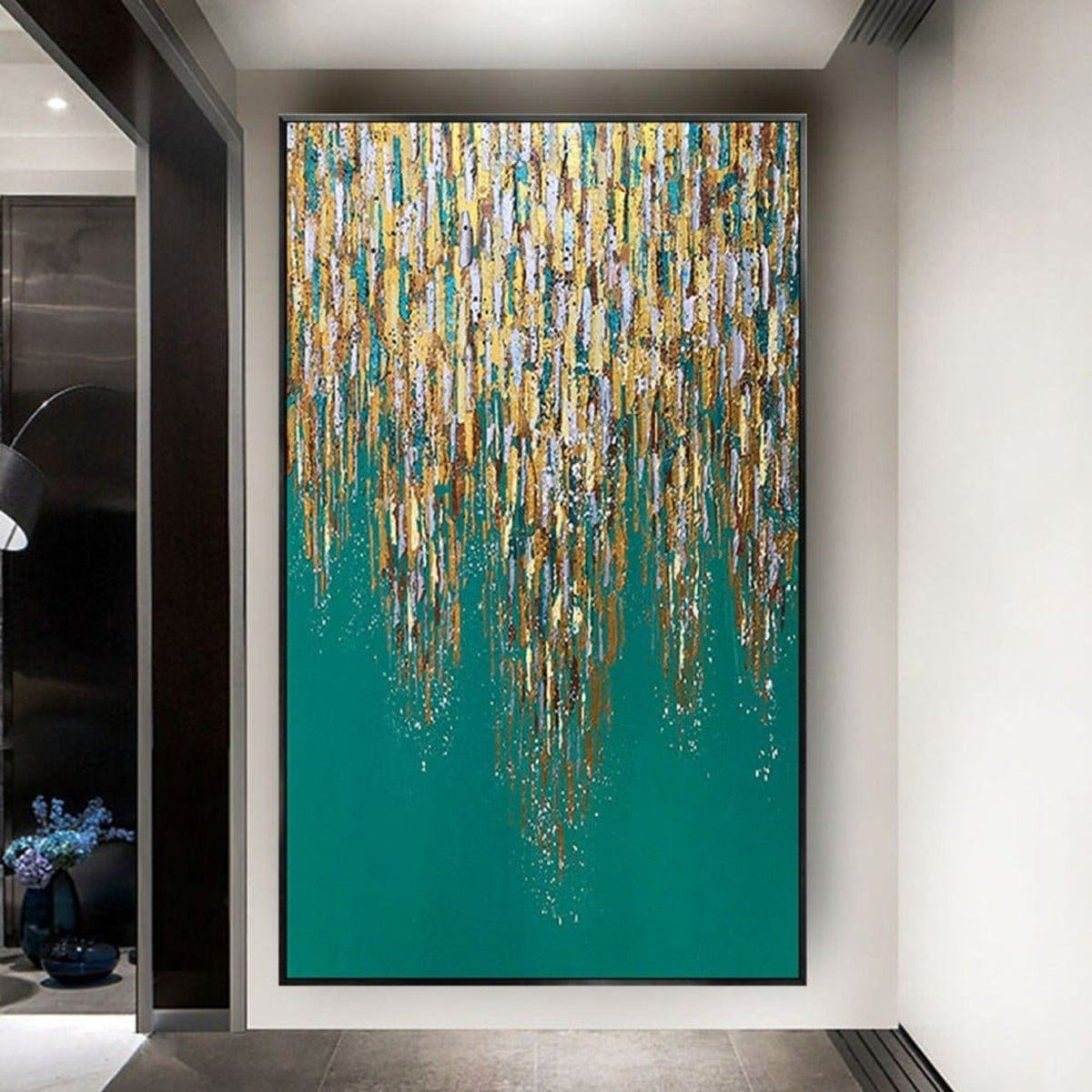Room mockup. Dense gold-coloured, cream and muted grey vertical dabs taper into long drips over a deep teal field.