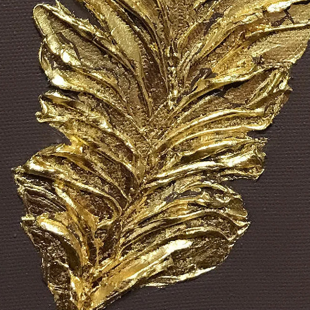 Close-up of single gold-coloured feather with layered raised barbs on a dark brown background.