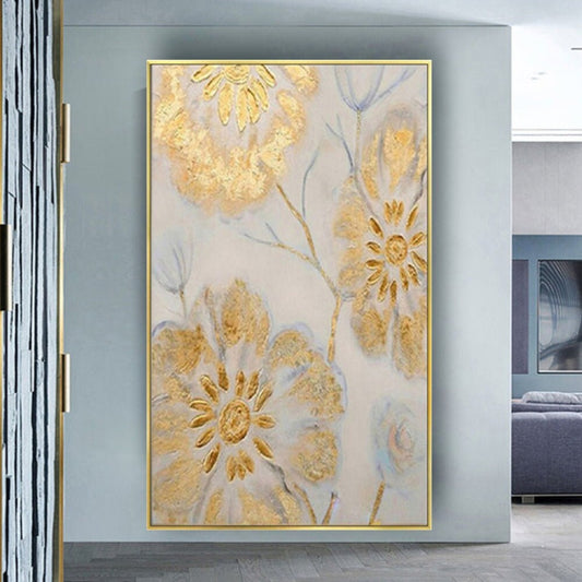 Room mockup. Large gold-coloured textured flowers with thin pale blue stems and leaves on a soft grey-white background.