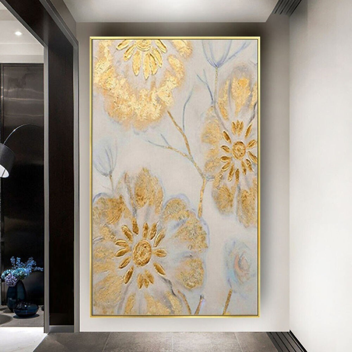 Room mockup. Large gold-coloured textured flowers with thin pale blue stems and leaves on a soft grey-white background.