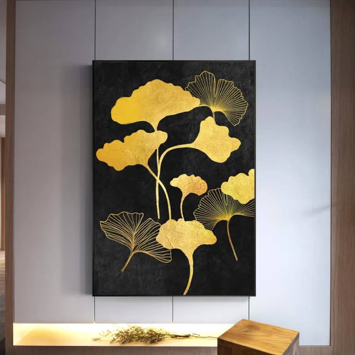 Room mockup. Gold-coloured fan-shaped leaves on curved slender stems, some filled and some finely outlined, against black.