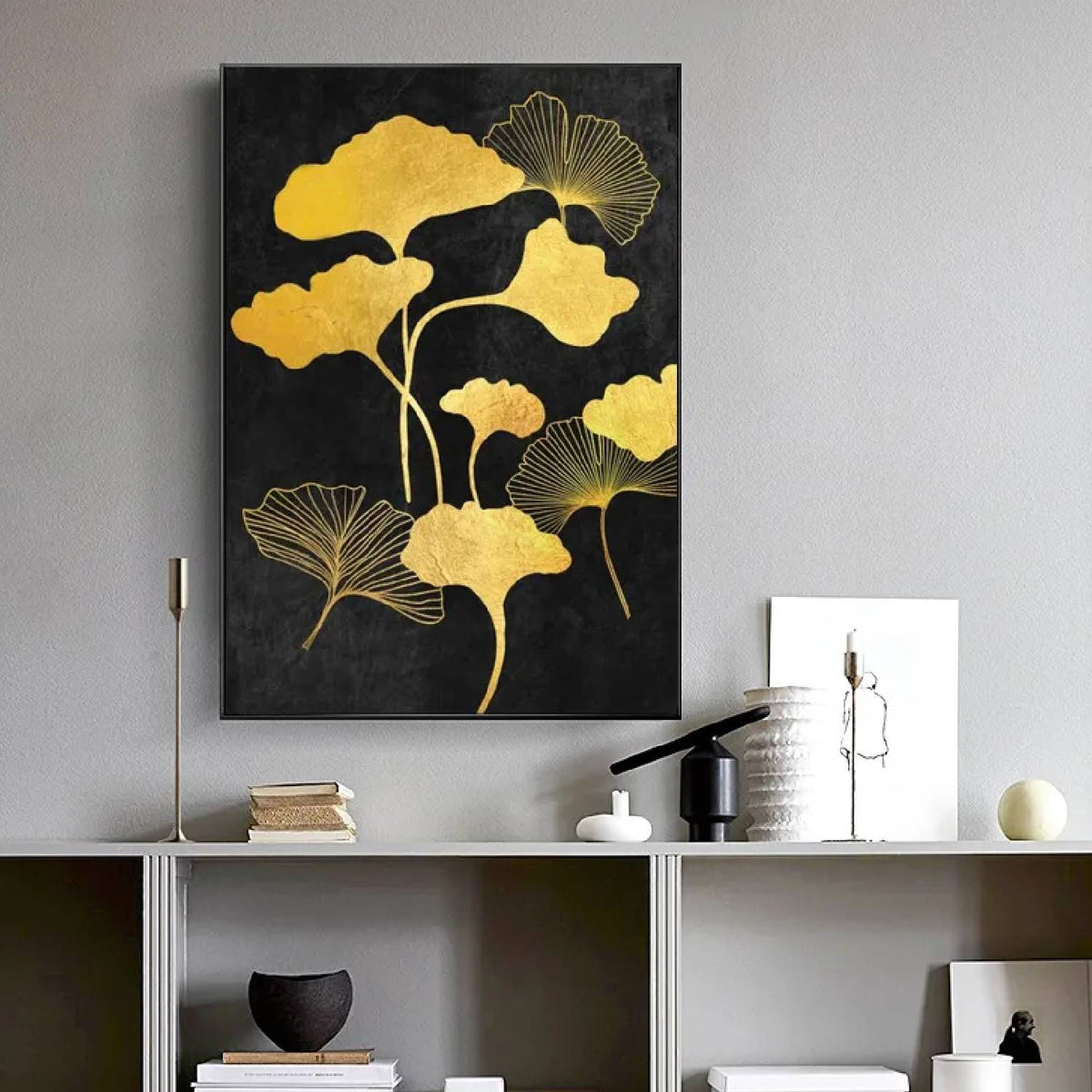 Room mockup. Gold-coloured fan-shaped leaves on curved slender stems, some filled and some finely outlined, against black.