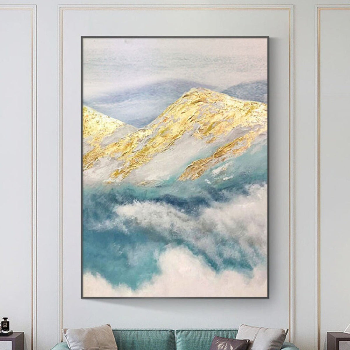 Room mockup. Gold-coloured mountain ridges rise above soft teal and white cloud-like strokes beneath a pale grey sky.