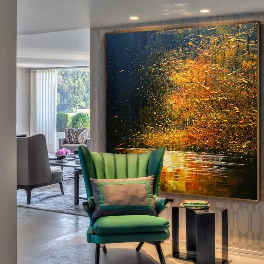Room mockup showing dense gold-coloured and orange tree-like marks against a navy background reflected in bright horizontal strokes below.
