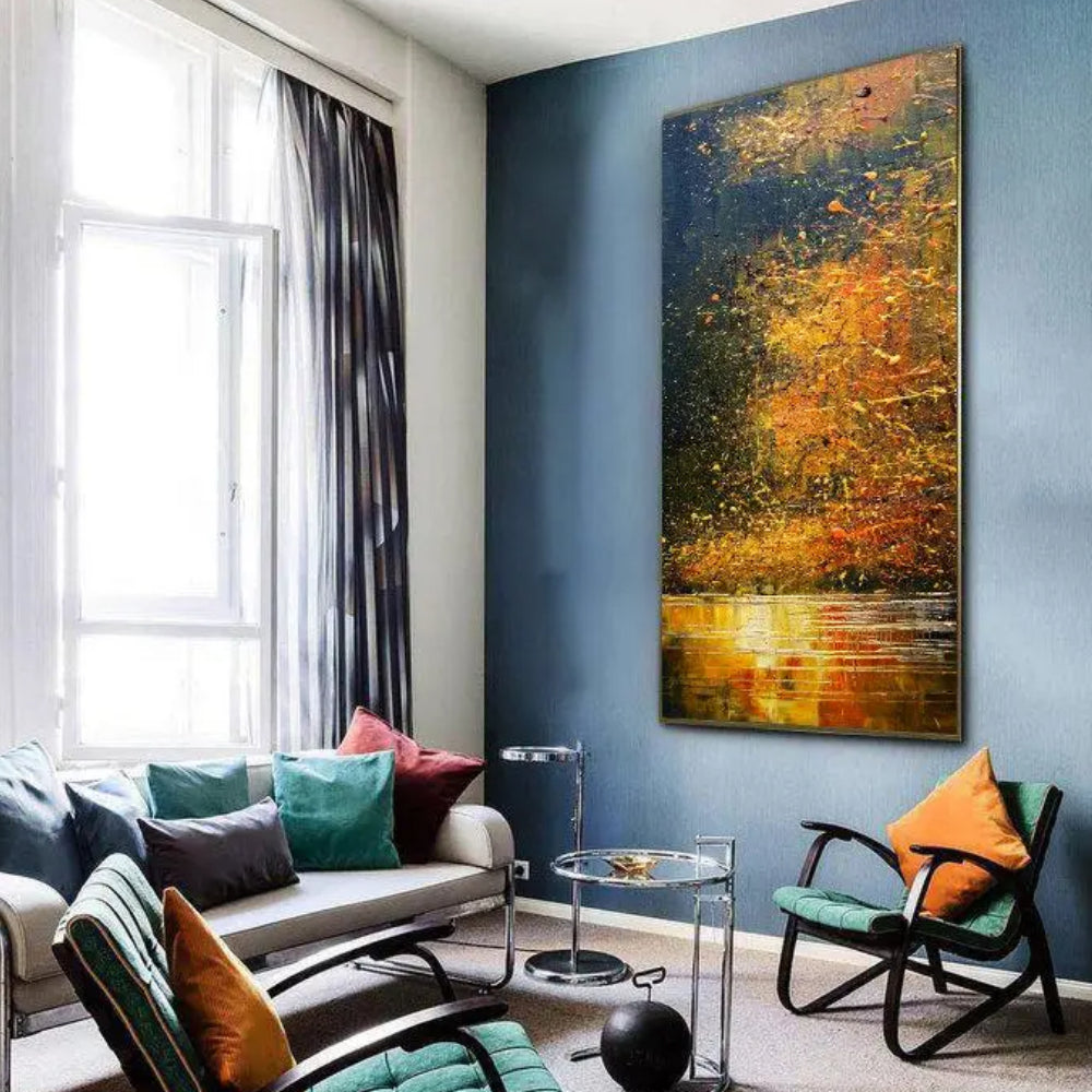 Room mockup showing dense gold-coloured and orange tree-like marks against a navy background reflected in bright horizontal strokes below.