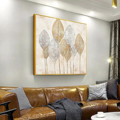 Room mockup. Tall gold-coloured and silver-grey leaf skeletons on fine stems against a pale cream textured background.