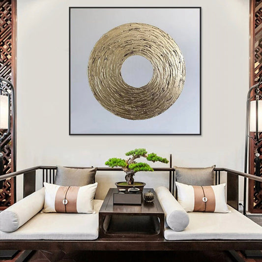 Room mockup. A thick gold-coloured textured ring with fine concentric ridges on a pale white-grey square background.