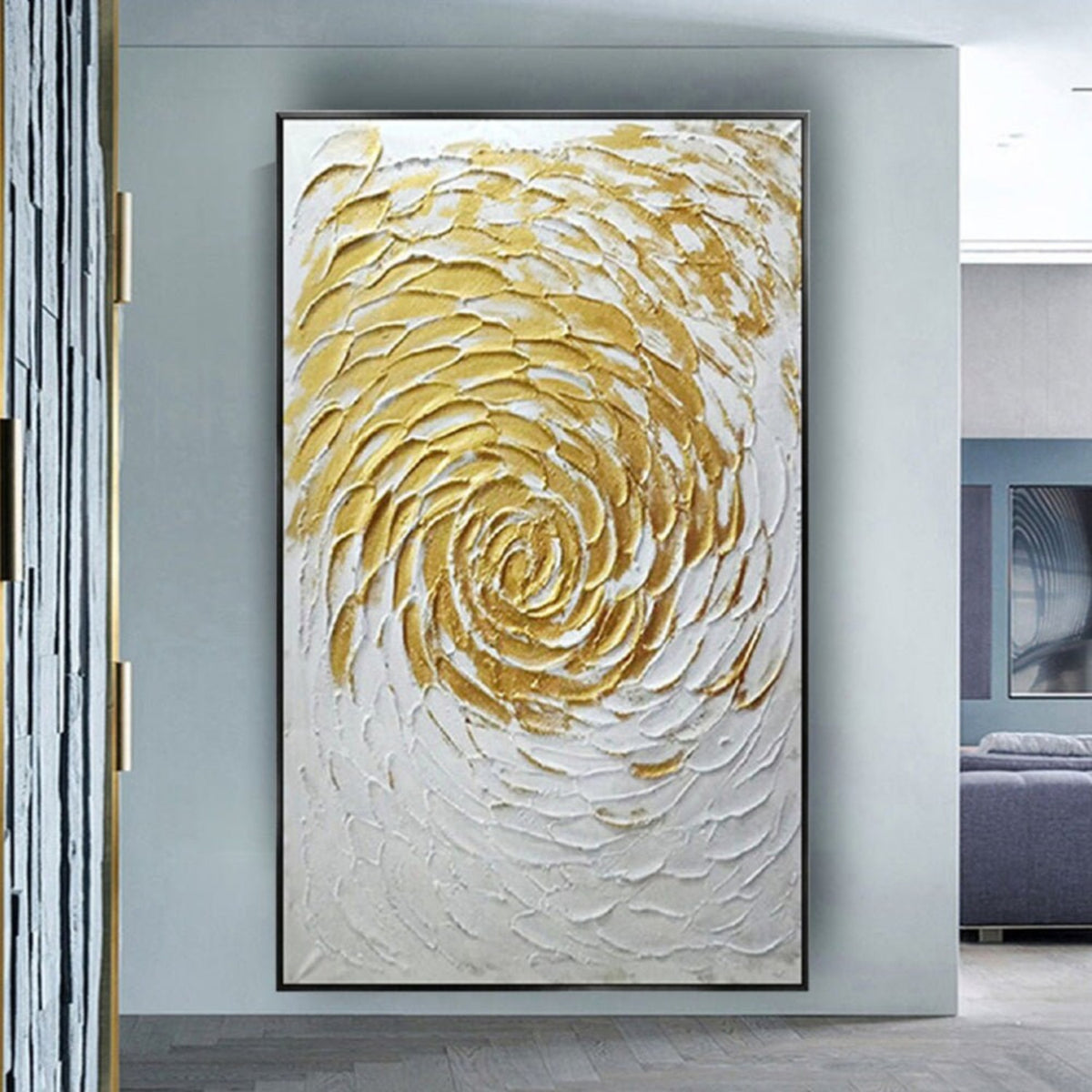 Room mockup. Raised gold-coloured and white petal-like strokes spiral outward from a small centre over a white textured field.