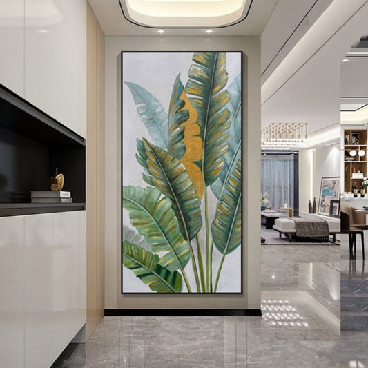 Room mockup. Tall green tropical leaves with pale veins and ochre patches rise on fine stems against a pale grey-white background.