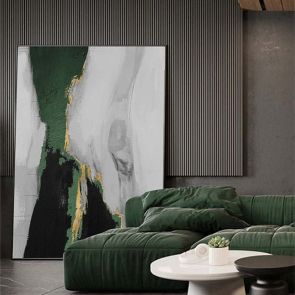 Room mockup. Dark green and black irregular fields taper between broad pale grey-white strokes with fine gold-coloured edges.