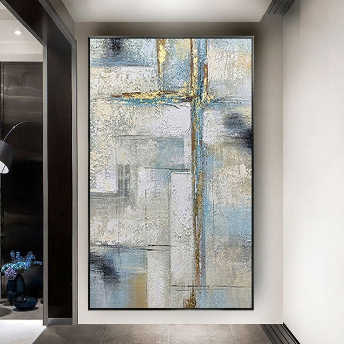 Room mockup. Pale grey and blue rectangular fields crossed by fine gold-coloured vertical and horizontal lines and dark grey patches.