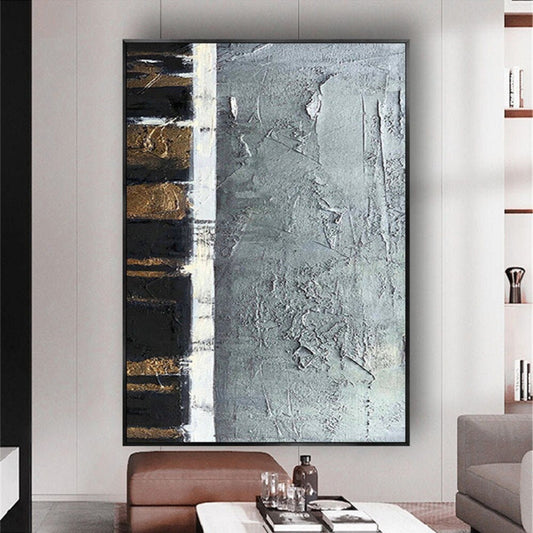 Room mockup. A broad cracked grey textured field beside a narrow black strip crossed by short gold-coloured bars and a white divider.
