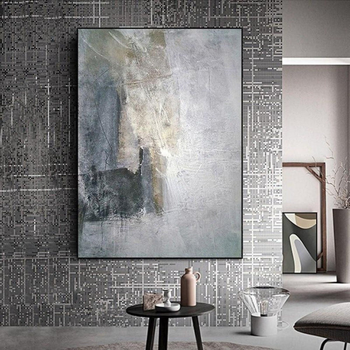 Room mockup. Soft grey and pale cream textured fields with darker vertical marks and a muted dark block near the lower left.