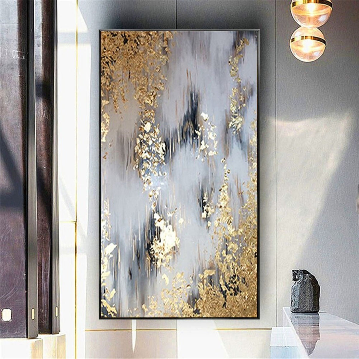 Room mockup. Soft grey and white vertical strokes with narrow black accents and dense gold-coloured textured patches near opposing edges.