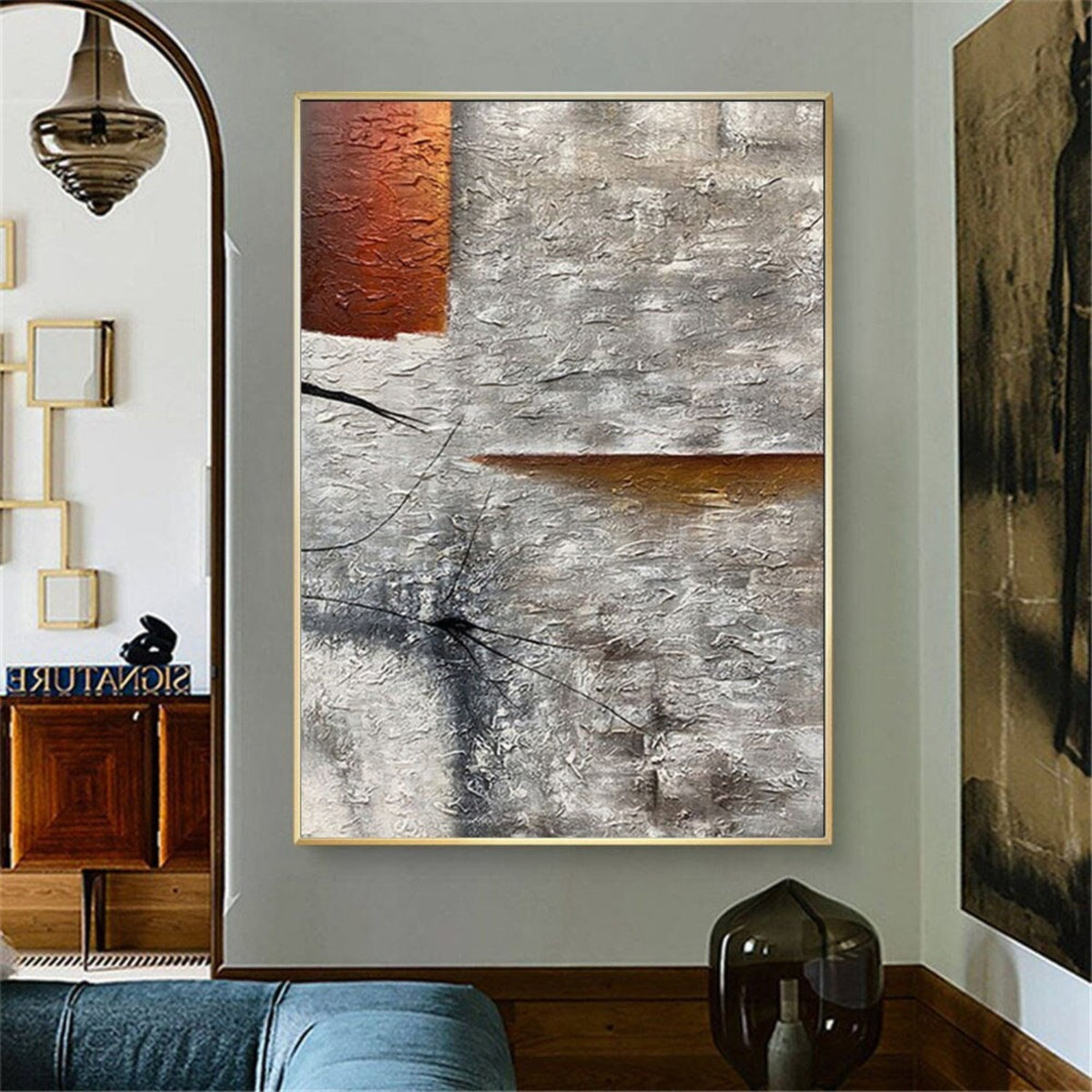 Room mockup. Rough grey and white texture with black scratched marks, a rust-orange upper block and a narrow orange horizontal strip.