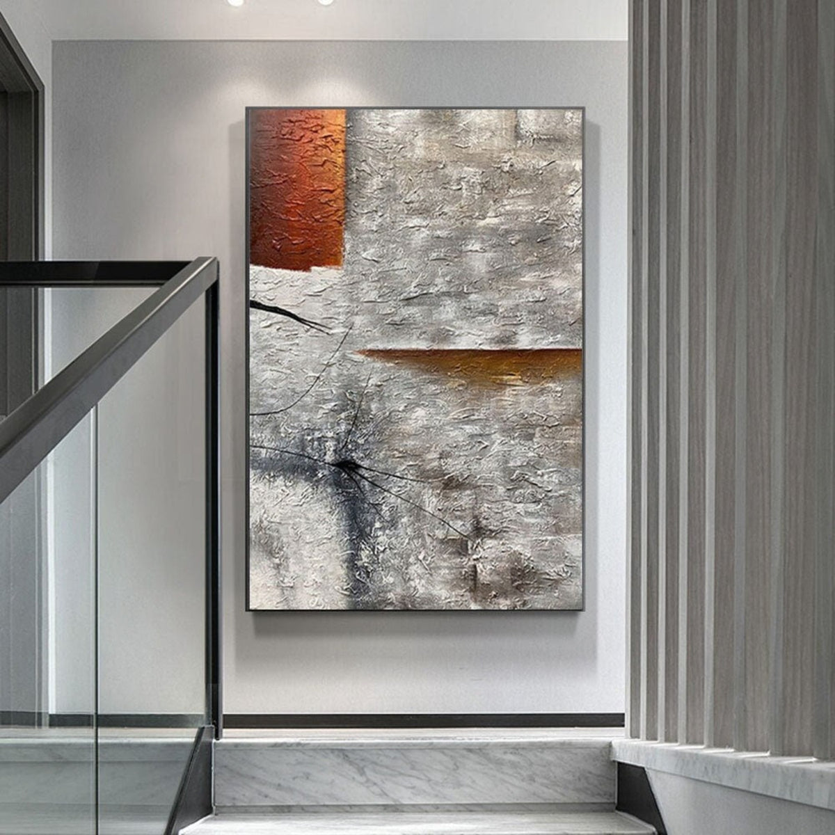 Room mockup. Rough grey and white texture with black scratched marks, a rust-orange upper block and a narrow orange horizontal strip.