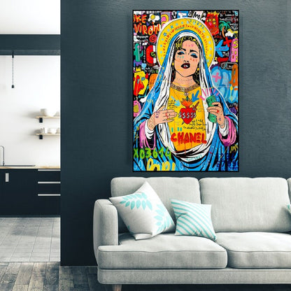Room mockup. A haloed woman with a blue and pink veil and bright yellow chest panel amid colourful graffiti lettering.