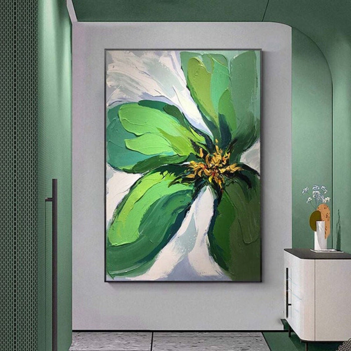 Room mockup. A large green flower with broad layered petals and a yellow-dark centre against pale white and grey strokes.