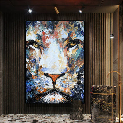 Room mockup. Close frontal lion face built from blue, white, ochre and orange strokes, with golden eyes and a dark muzzle.