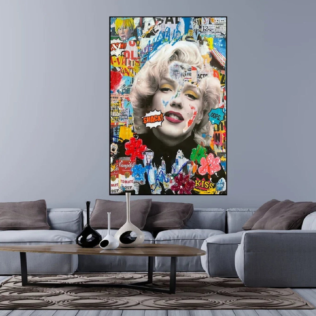 Room mockup. Marilyn Monroe portrait with pale blonde curls and red lips surrounded by dense colourful graffiti and flowers.