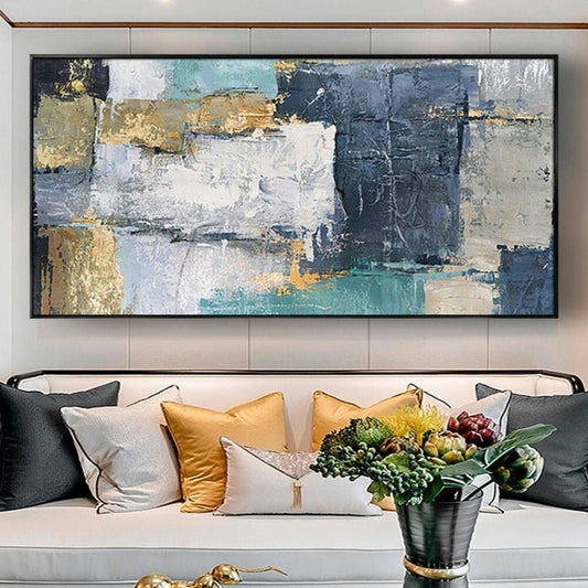Room mockup. Rough navy, grey and white rectangular blocks overlap gold-coloured patches and a muted teal lower strip.