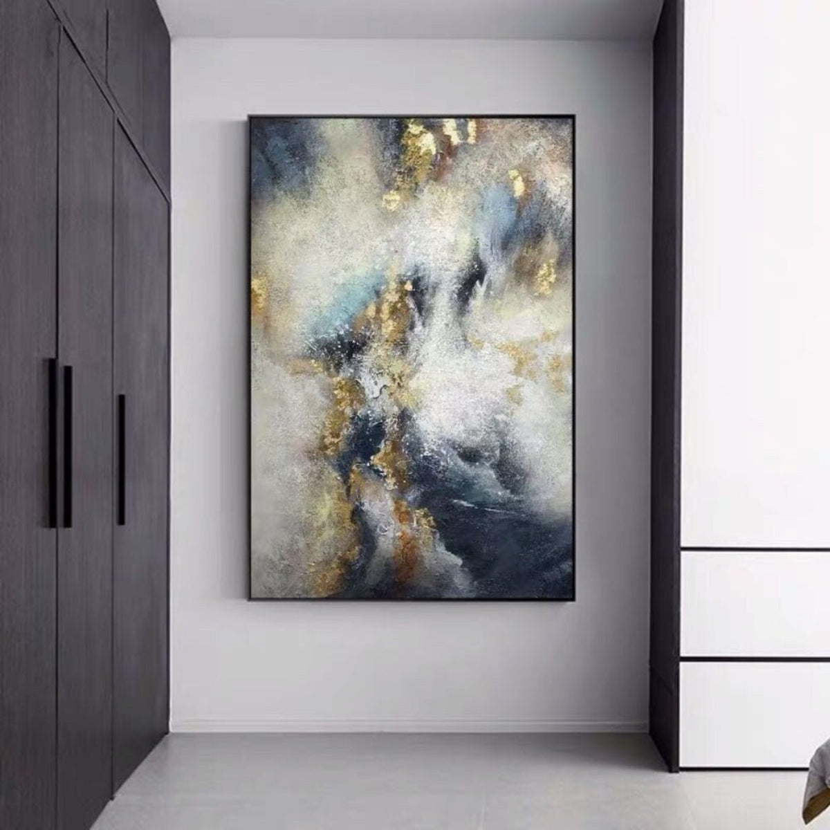 Room mockup. Cloud-like white and cream strokes cross deep navy and grey fields with scattered gold-coloured textured patches.