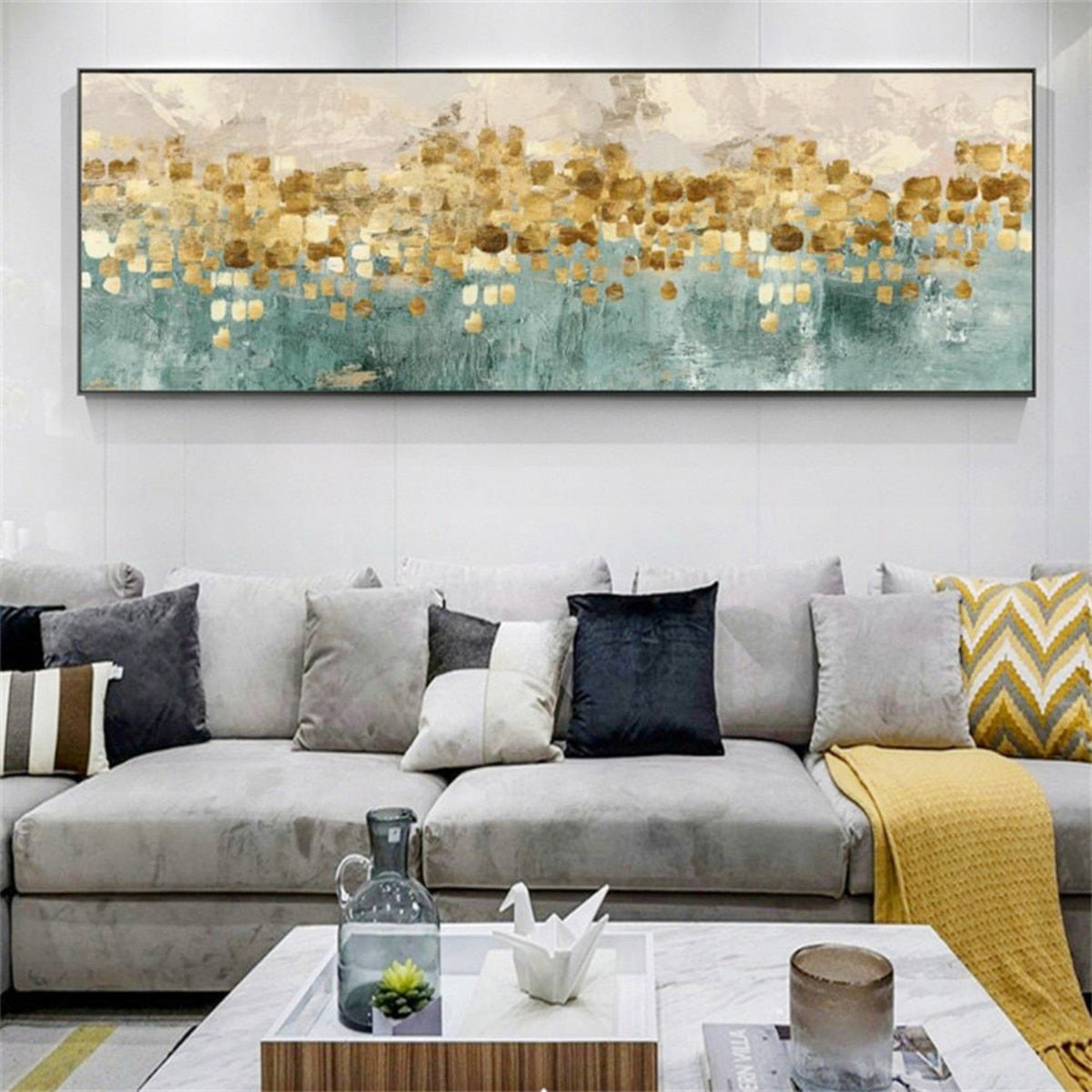 Room mockup. Small ochre, gold-coloured and cream rectangular dabs form a horizontal band above muted teal strokes.